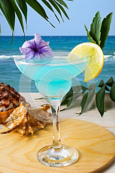 Blue Hawaiian cocktail on the tropical beach