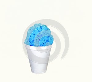 Blue Hawaiian Shave ice, Shaved ice or snow cone dessert in a plain white cup.