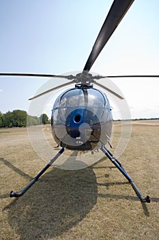 Blue helicopter on the ground