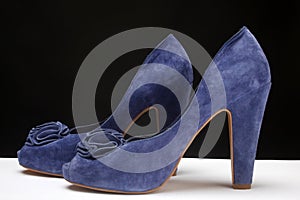 Blue high heeled shoe