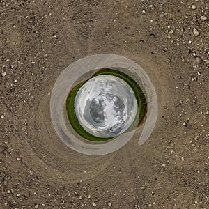 blue hole sphere little planet inside sand round frame background