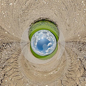 blue hole sphere little planet inside sand round frame background