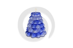 Blue holiday candle stands on porcelain stand