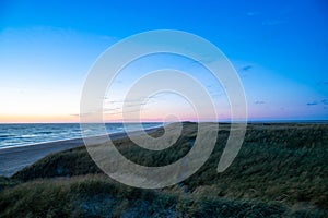 Blue hour on the beach after sunset North Sea Denmark