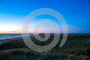 Blue hour on the beach after sunset North Sea Denmark