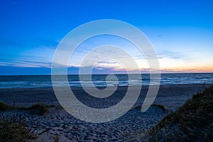 Blue hour on the beach after sunset North Sea Denmark