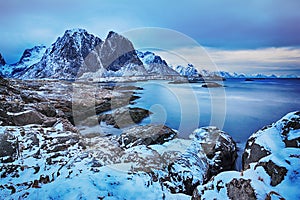 Blue hour. Beautiful winter landscape of picturesque mountains of Lofoten islands