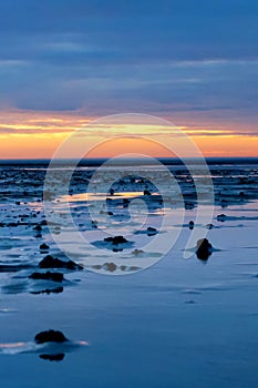 Blue hour in the Lower Saxony Wadden Sea off Cuxhaven Sahlenburg at low tide, Germany