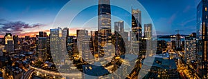 Blue hour with a pink sunset over San Francisco skyline with Salesforce Tower in the middle and Salesforce park at the bottom