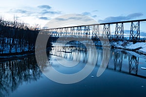 Blue hour view of the 1908 railway trestle bridge over the Cap-Rouge River