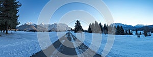 Blue hour at winter landscape buckelwiesen, country road from Krun to Mittenwald, bavarian landscape