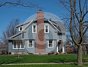 Blue House with Shake Siding and Fireplace Chimney