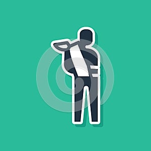 Blue Human broken arm icon isolated on green background. Injured man in bandage. Vector
