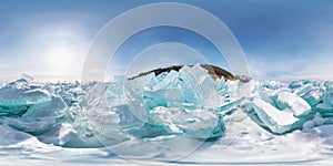 Blue hummocks of winter Lake Baikal in the afternoon under a blue sky. Spherical panorama 360vr photo