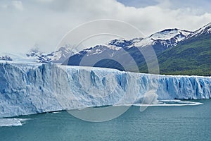 Blue ice of calving Perito Moreno Glacier in Glaciers national park in Patagonia