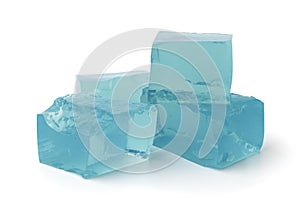 The blue ice cubes on a white