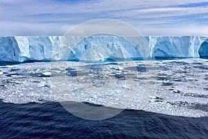 Blue Iceberg floating in Antarctica