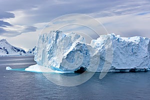 Blue Iceberg Floating in Antarctica