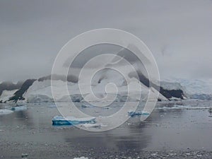 Blue Iceberg floating off the coast of Antarctica