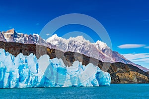 Blue Iceberg of Grey Glacier, The ripples of Grey Lake and the beautiful mountain