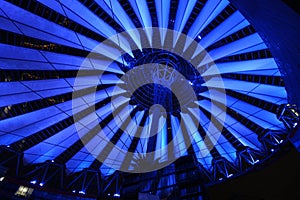 Blue illumination of Sony center roof at night