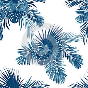 Blue indigo tropical pattern with jungle plants. Seamless tropical fabric design with phoenix palm leaves.