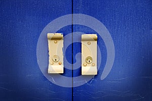Blue Industrial Metal Door with Handles for Opening and Locks