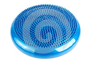 Blue inflatable balance disk isoleated on white background, It is also known as a stability disc, wobble disc, and