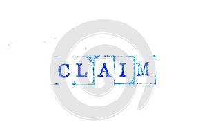 Blue ink of rubber stamp in word claim on white paper background