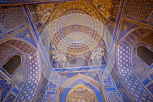 Blue interior of Tile Karl Madrasa in The Registan, Samarkand, U