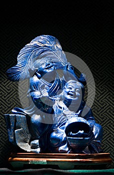 Blue Jade sculpture of God of wealth in China