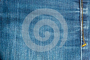 Blue jean background, Denim with seam texture of the fabric.