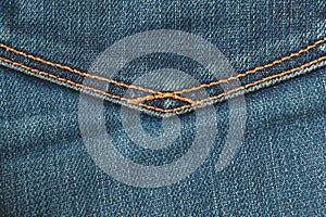 Blue jean background, Denim with seam texture of the fabric.