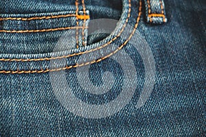 Blue jean background, Denim with seam texture of the fabric.