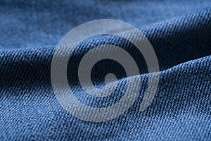 Blue jeans apparel and brown cord fabric wave background texture, cloth garment concept