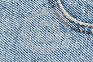 Blue jeans denim material with stiches background