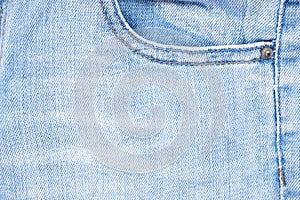 Blue jeans front pocket. Denim texture of white jeans background, classic jeans