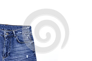 Blue jeans isolated on white background top view flat lay. Detail of nice blue jeans. Jeans texture or denim background. Trend
