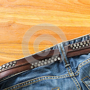 Blue jeans with leather belt