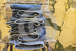 Blue jeans on old chair. Jeans texture.