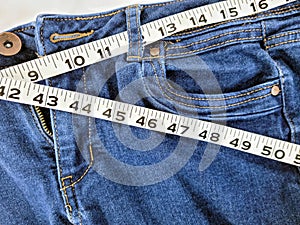 Blue Jeans with Tape Measure