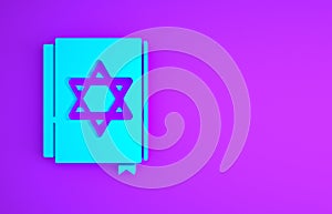 Blue Jewish torah book icon isolated on purple background. Pentateuch of Moses. On the cover of the Bible is the image of the Star