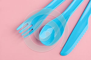 Blue knife, spoon and fork