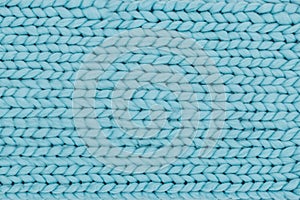 Blue knitted background from thick yarn