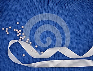 Blue knitted pattern, white satin silk lace and pearl beads