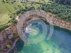 Blue laggon see from above in old sand mine in Poland. photo