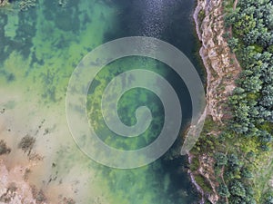 Blue laggon see from above in old sand mine in Poland. photo