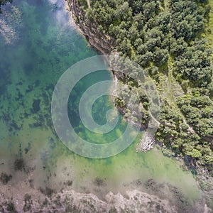 Blue laggon see from above in old sand mine in Poland. photo