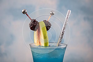 Blue Lagoon Blue Hawaiian Cocktail Vodka Alcoholic Drink. Iced blue cosmopolitan cocktail. Blue margarita. Blue curacao liqueur.
