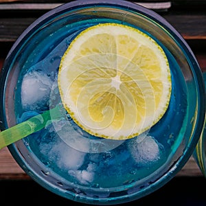 Blue lagoon coctail with lemon